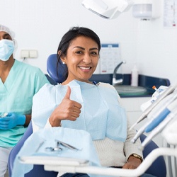 Candidate for nitrous oxide dental sedation in Eatontown giving a thumbs up