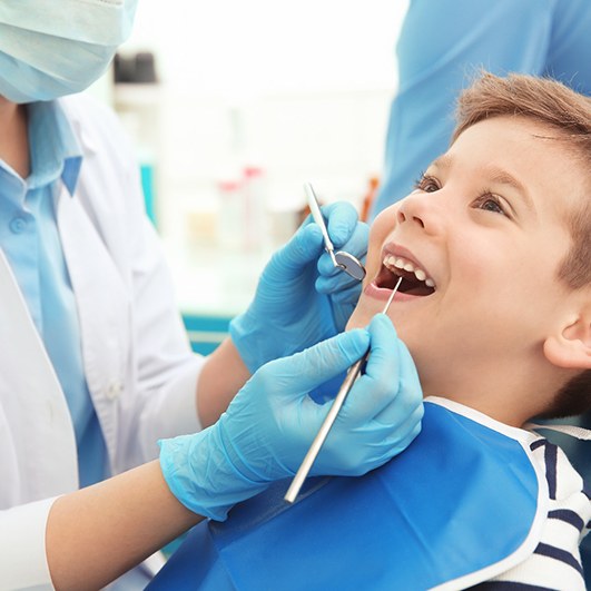 Child getting a dental filling