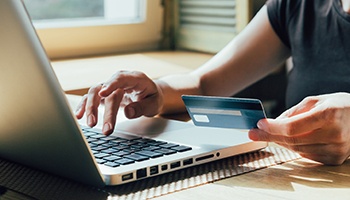 Woman using a credit card