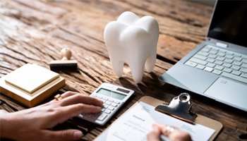 A dental patient reviewing their dental insurance 