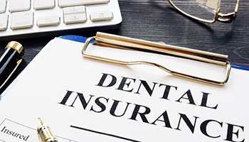 Dental insurance form resting on a table