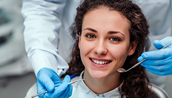 Woman smiling at her dental checkup