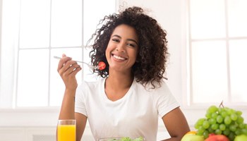 woman eating salad