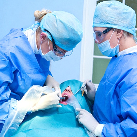 Implant dentist in Eatontown performing oral surgery
