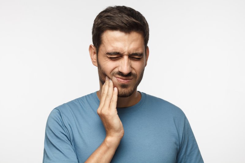 man with tooth pain