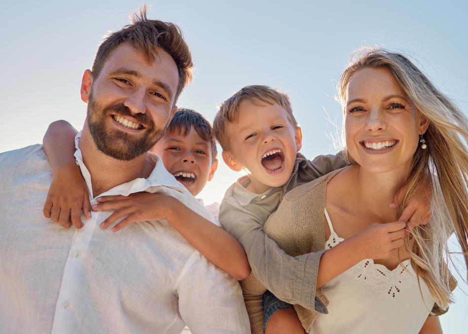 Smiling family at the beach